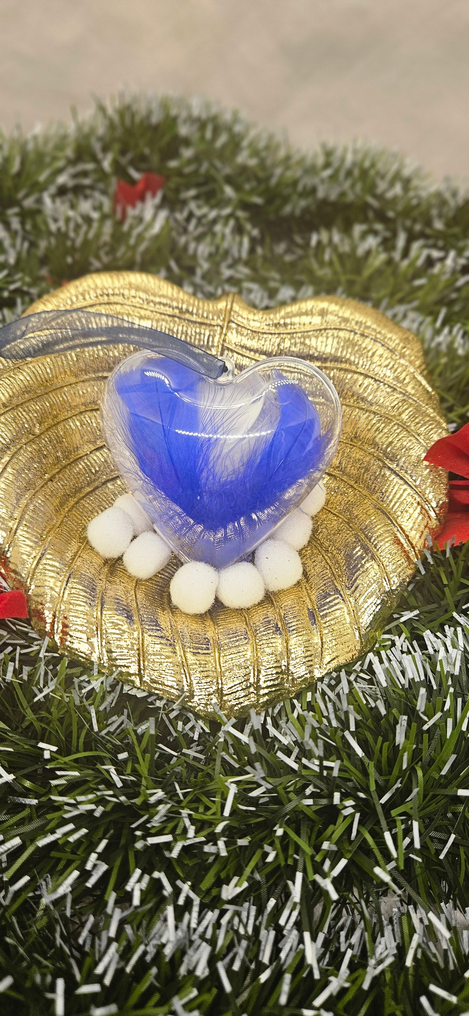 Boule coeur plume bleu